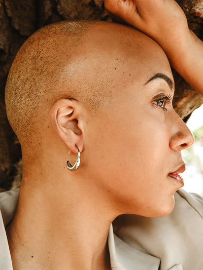 Female model wearing silver  Crescent Moon Threader Drop Earrings.